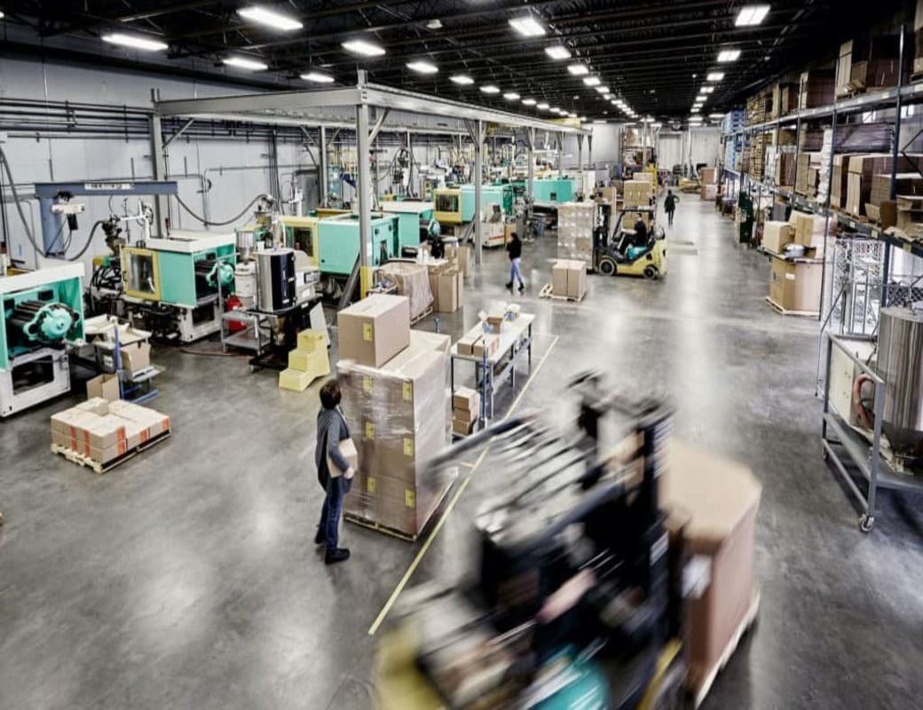 Plastic Alternatives manufacturing floor with injection molding presses in Minnesota
